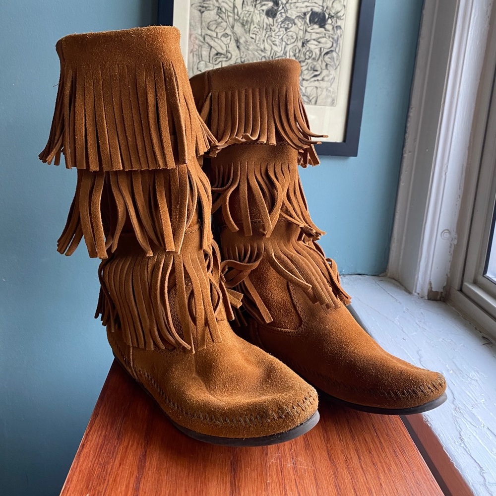 Mid thigh high Minnetonka moccasin boots